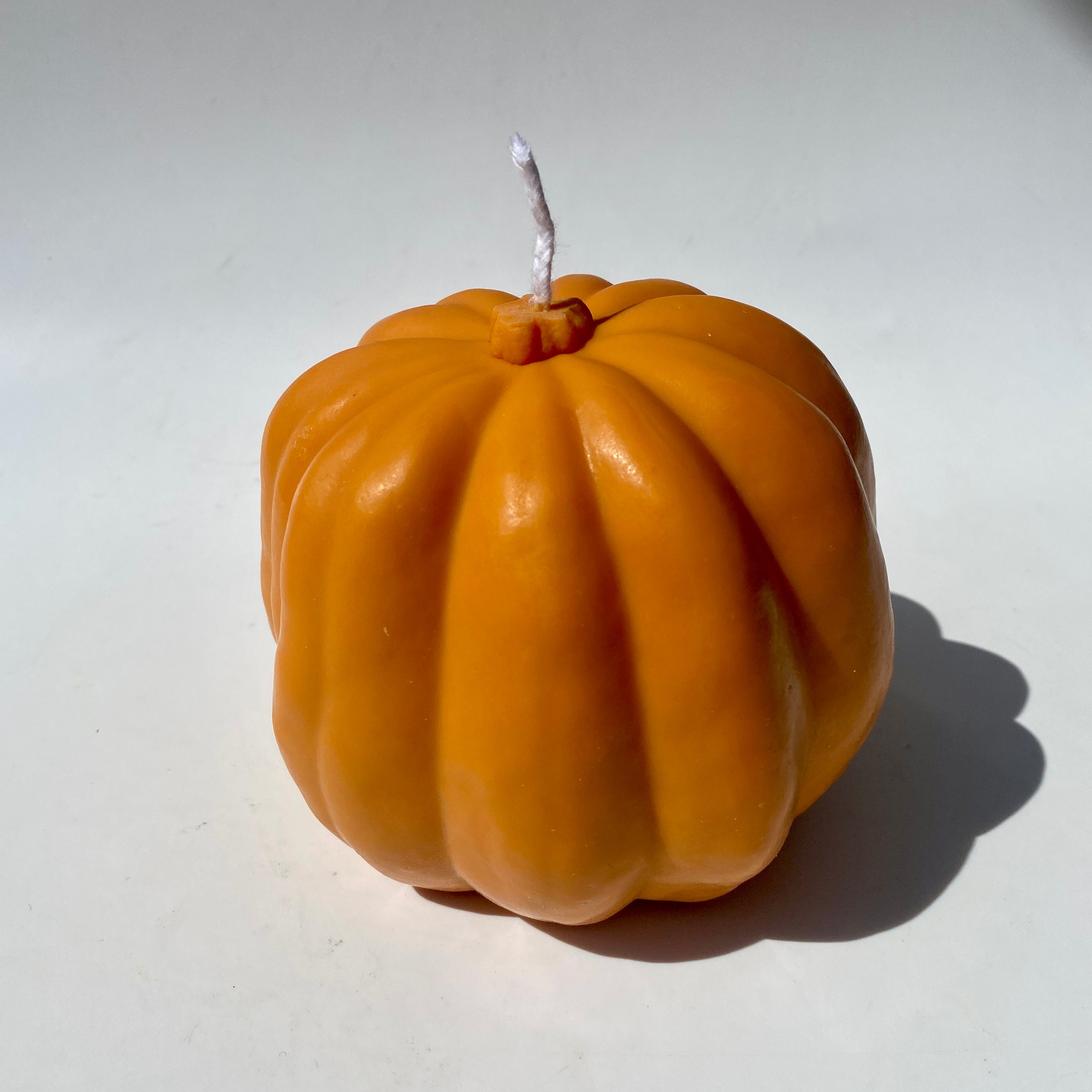 Pumpkin candle hand poured vegan soy wax.
